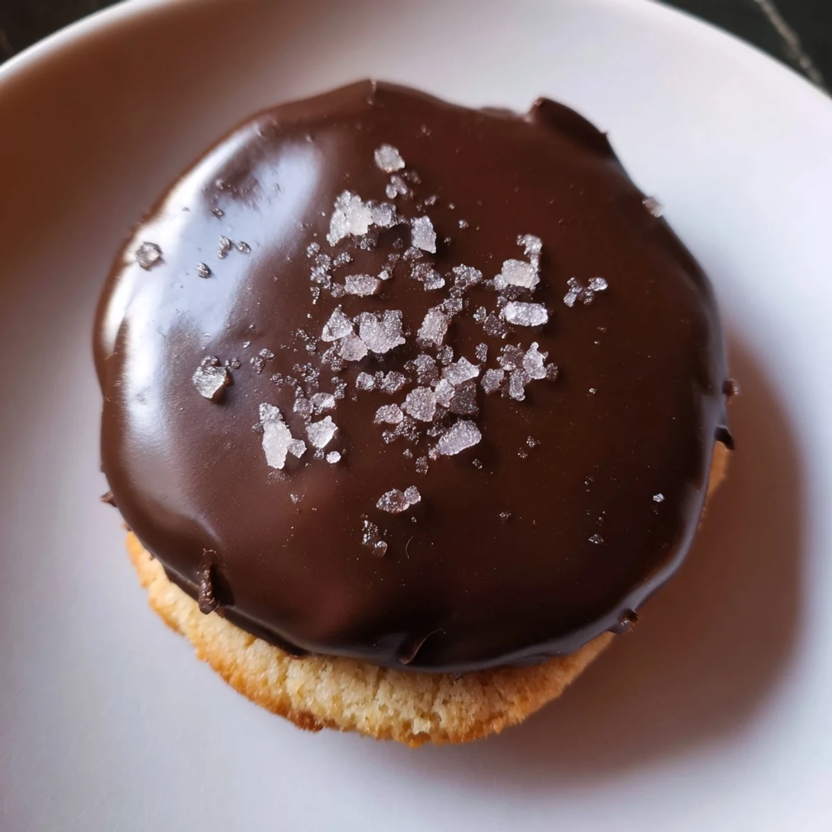 Warm 3-Ingredient Peanut Butter Blossom Cookies, their chocolate kisses glistening after baking.