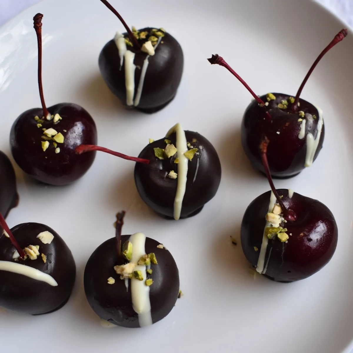 A visually stunning pyramid of chocolate-covered cherry dessert bites ready for your sweet tooth.