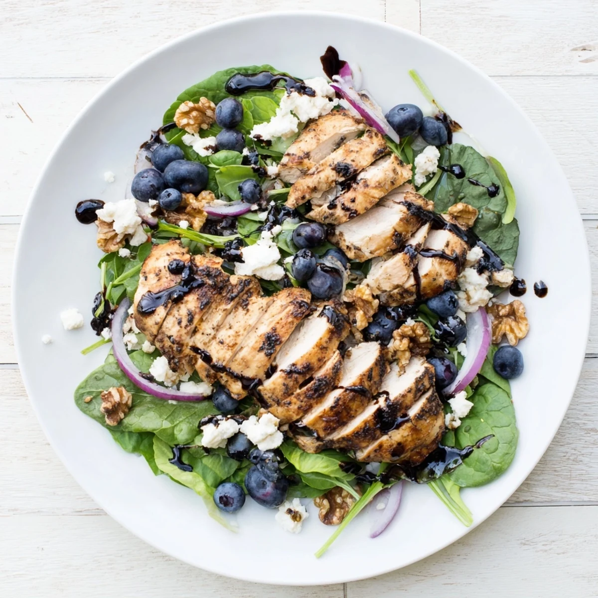 This salad features flavorful chicken, creamy goat cheese, and a colorful mix, called Blueberry Goat Cheese Chicken Salad.