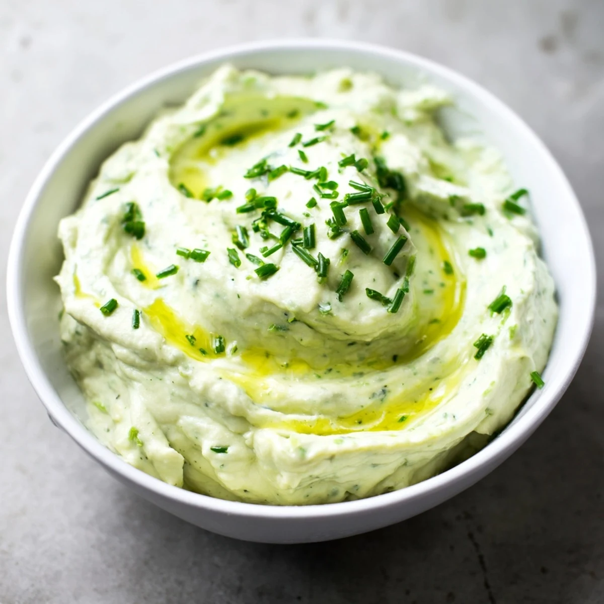 Enjoy a spoonful of flavorful Avocado Cottage Cheese Dip, perfect as a snack or appetizer, ready in minutes.