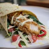 Freshly assembled Santa Hat Chicken Caesar Wrap, filled with juicy chicken and creamy Caesar dressing.