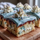 Festive vanilla sheet cake decorated with buttercream and Class of 2026 piping, ideal for graduation parties.  