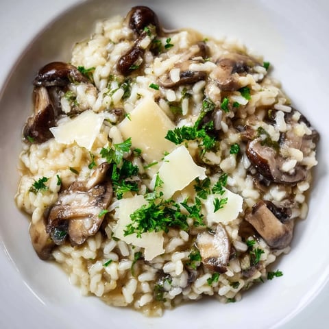 Creamy Italian Mushroom Risotto, showcasing Arborio rice and tender mushrooms, perfect for a cozy dinner.