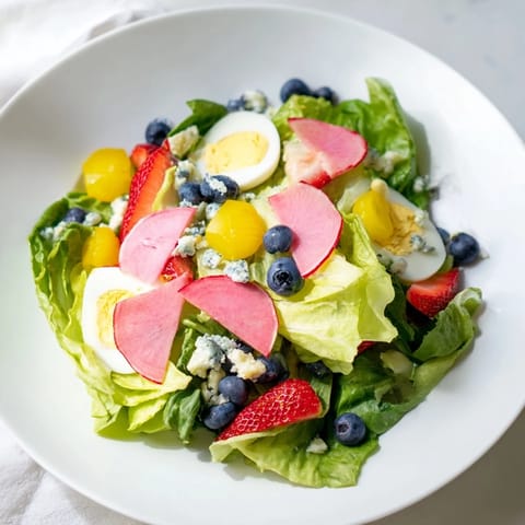 This baby shower pastel palette salad boasts a beautiful array of colorful, fresh, and vibrant ingredients.