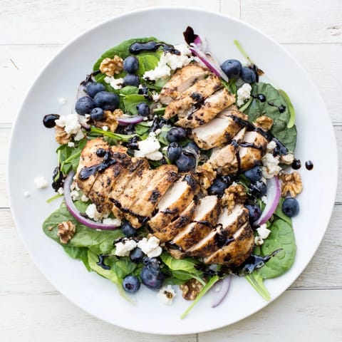 This salad features flavorful chicken, creamy goat cheese, and a colorful mix, called Blueberry Goat Cheese Chicken Salad.