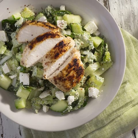 These delicious Green Goddess Chicken Wraps feature grilled chicken and a vibrant veggie-packed filling for a flavorful bite.