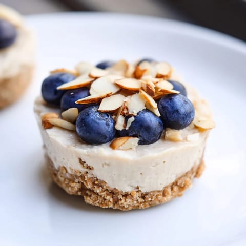 These creamy Protein Cheesecake Cups are beautifully chilled, offering a perfect high-protein snack sensation.
