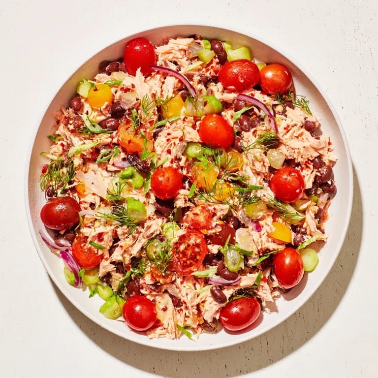 Flaky tuna and chickpeas make up this vibrant Dense Chickpea and Tuna Salad, a perfect lunch now!