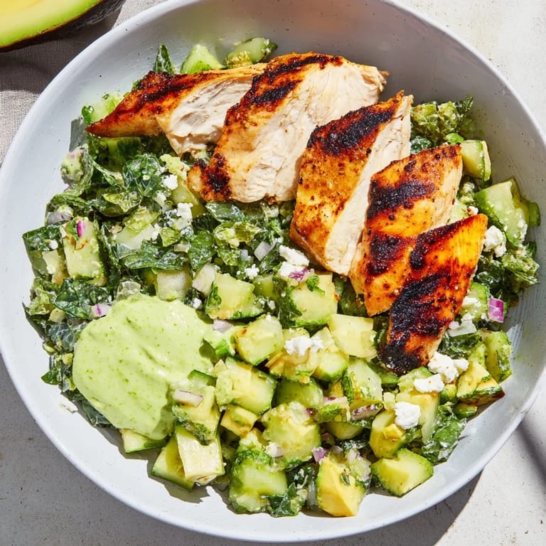 Vibrant Green Goddess Chicken Wraps are packed, with a satisfying crunch from the fresh cabbage salad, ready to eat.