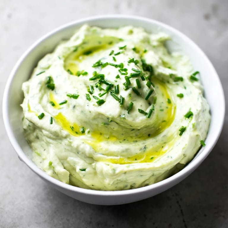Enjoy a spoonful of flavorful Avocado Cottage Cheese Dip, perfect as a snack or appetizer, ready in minutes.