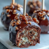 Festive Pot of Gold Cake Pops with edible gold sprinkles, perfect for St. Patrick's Day celebrations.