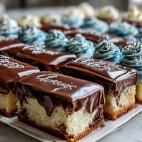 Moist vanilla sheet cake with creamy buttercream and Class of 2026 piping, perfect for graduation celebrations.  